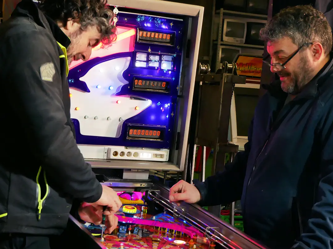Nicola and Davide from Pinball Magic, three generation family pinball restoration team