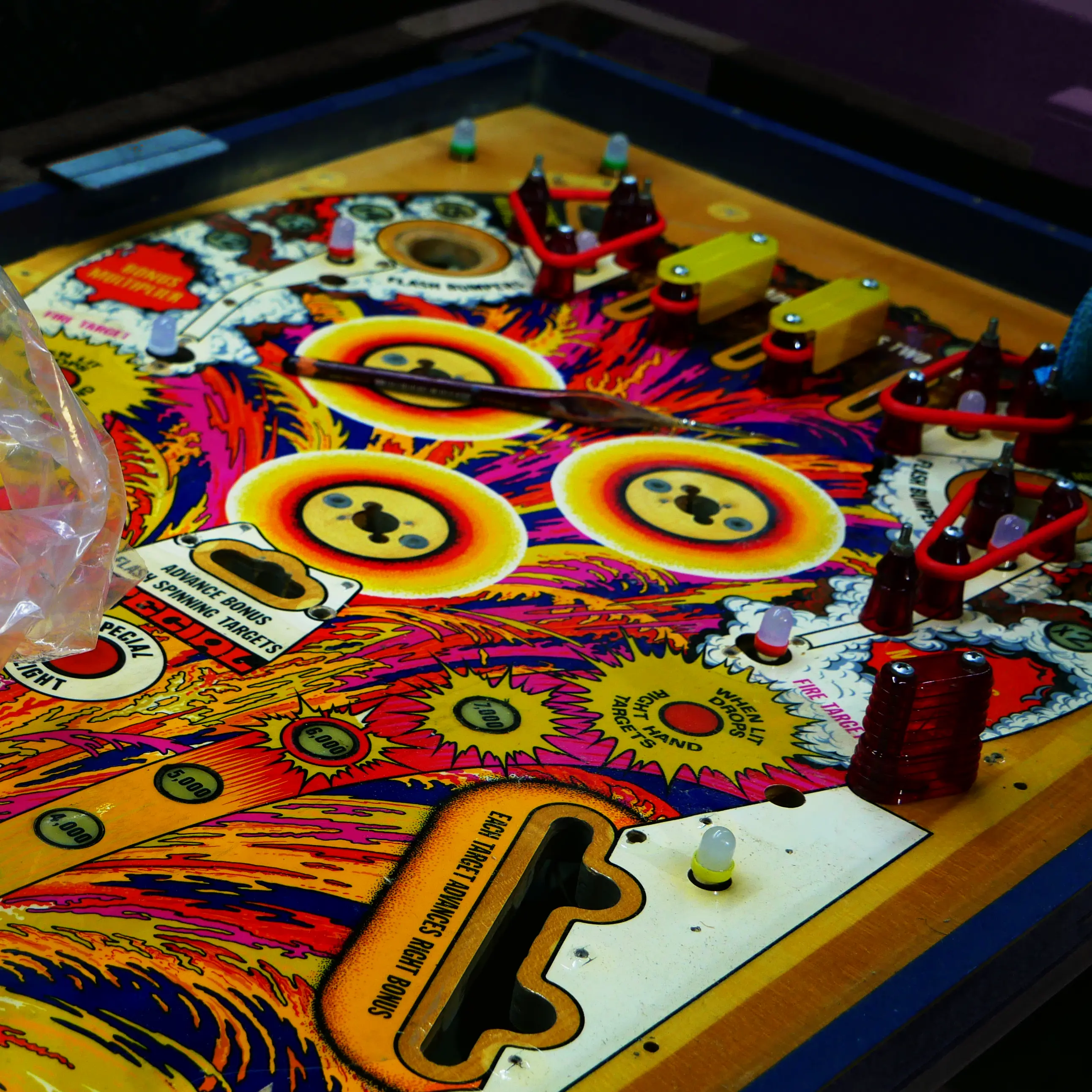 Fully restored pinball playfield stripped, repainted and clearcoated